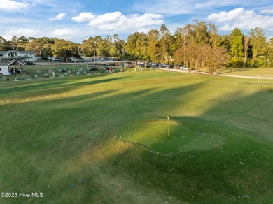 Fresh, bright, and move-in ready--this ground-floor 2BR/2BA on Olde Point Golf and Country Club in North Carolina - for sale on GolfHomes.com, golf home, golf lot
