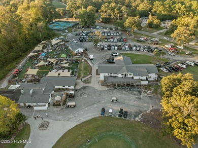 Fresh, bright, and move-in ready--this ground-floor 2BR/2BA on Olde Point Golf and Country Club in North Carolina - for sale on GolfHomes.com, golf home, golf lot
