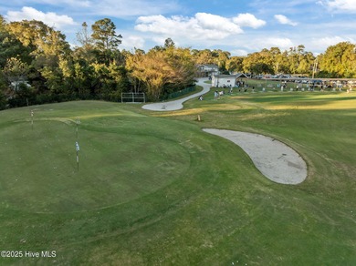 Fresh, bright, and move-in ready--this ground-floor 2BR/2BA on Olde Point Golf and Country Club in North Carolina - for sale on GolfHomes.com, golf home, golf lot