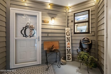 Fresh, bright, and move-in ready--this ground-floor 2BR/2BA on Olde Point Golf and Country Club in North Carolina - for sale on GolfHomes.com, golf home, golf lot