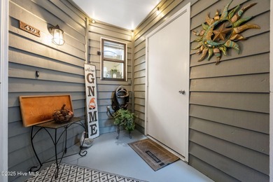 Fresh, bright, and move-in ready--this ground-floor 2BR/2BA on Olde Point Golf and Country Club in North Carolina - for sale on GolfHomes.com, golf home, golf lot