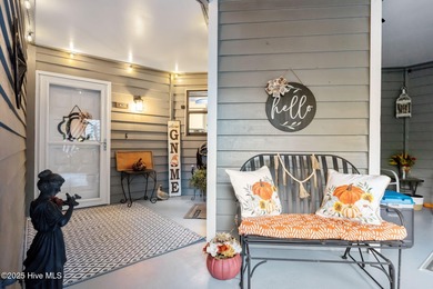 Fresh, bright, and move-in ready--this ground-floor 2BR/2BA on Olde Point Golf and Country Club in North Carolina - for sale on GolfHomes.com, golf home, golf lot