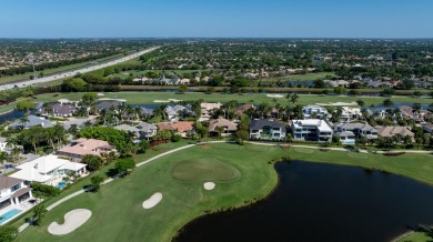 Overlooking the seventh hole of the Kipp Schulties Championship on St. Andrews Country Club of Boca Raton in Florida - for sale on GolfHomes.com, golf home, golf lot
