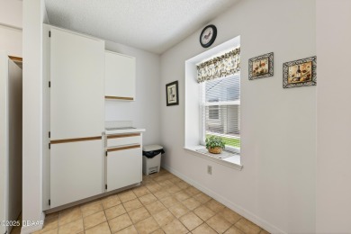 Warm and Inviting 2 bedroom 2 bath patio-style condo in a on The Club At Pelican Bay - South Course in Florida - for sale on GolfHomes.com, golf home, golf lot