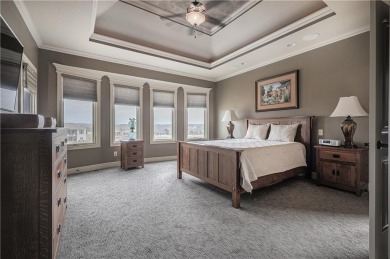 This stunning reverse 1.5-story home in Creekmoor offers an on Golf Club of Creekmoor in Missouri - for sale on GolfHomes.com, golf home, golf lot
