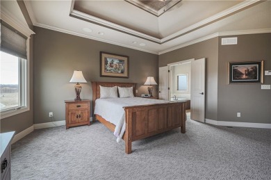 This stunning reverse 1.5-story home in Creekmoor offers an on Golf Club of Creekmoor in Missouri - for sale on GolfHomes.com, golf home, golf lot