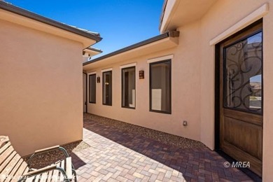 Discover modern desert living at 479 Apogee CRST!! This stunning on Falcon Ridge Golf Course in Nevada - for sale on GolfHomes.com, golf home, golf lot