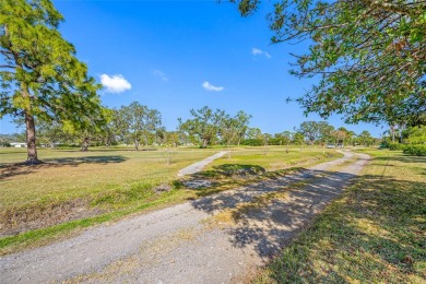 Under contract-accepting backup offers. Golf Course Living at on Mainlands Golf Club in Florida - for sale on GolfHomes.com, golf home, golf lot