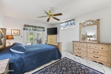 Warm and Inviting 2 bedroom 2 bath patio-style condo in a on The Club At Pelican Bay - South Course in Florida - for sale on GolfHomes.com, golf home, golf lot