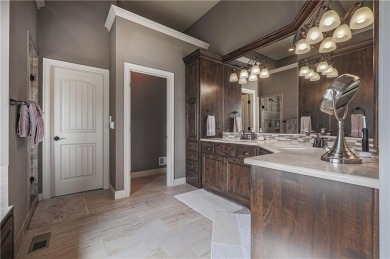 This stunning reverse 1.5-story home in Creekmoor offers an on Golf Club of Creekmoor in Missouri - for sale on GolfHomes.com, golf home, golf lot