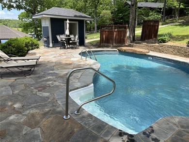 Experience resort-style living with this exceptional lakefront on Bella Vista Country Club - Berksdale in Arkansas - for sale on GolfHomes.com, golf home, golf lot