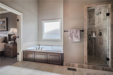 This stunning reverse 1.5-story home in Creekmoor offers an on Golf Club of Creekmoor in Missouri - for sale on GolfHomes.com, golf home, golf lot