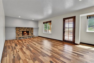 SITTING ON THE GOLF COURSE with both **mountain and city views** on Red Rocks Country Club in Colorado - for sale on GolfHomes.com, golf home, golf lot