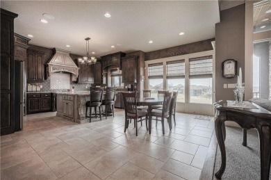 This stunning reverse 1.5-story home in Creekmoor offers an on Golf Club of Creekmoor in Missouri - for sale on GolfHomes.com, golf home, golf lot