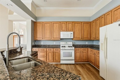 Beautiful home in Golf community of Eastwood. Home has spacious on Eastwood Golf Club in Florida - for sale on GolfHomes.com, golf home, golf lot
