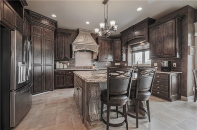 This stunning reverse 1.5-story home in Creekmoor offers an on Golf Club of Creekmoor in Missouri - for sale on GolfHomes.com, golf home, golf lot