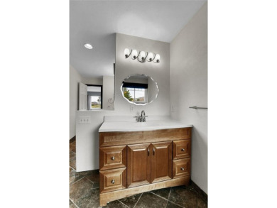SITTING ON THE GOLF COURSE with both **mountain and city views** on Red Rocks Country Club in Colorado - for sale on GolfHomes.com, golf home, golf lot