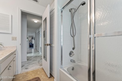 Warm and Inviting 2 bedroom 2 bath patio-style condo in a on The Club At Pelican Bay - South Course in Florida - for sale on GolfHomes.com, golf home, golf lot