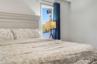 Experience resort-style living with this exceptional lakefront on Bella Vista Country Club - Berksdale in Arkansas - for sale on GolfHomes.com, golf home, golf lot