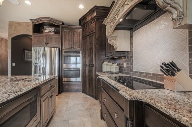 This stunning reverse 1.5-story home in Creekmoor offers an on Golf Club of Creekmoor in Missouri - for sale on GolfHomes.com, golf home, golf lot