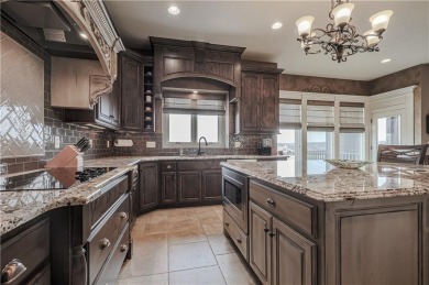 This stunning reverse 1.5-story home in Creekmoor offers an on Golf Club of Creekmoor in Missouri - for sale on GolfHomes.com, golf home, golf lot