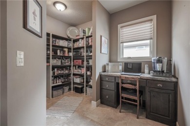 This stunning reverse 1.5-story home in Creekmoor offers an on Golf Club of Creekmoor in Missouri - for sale on GolfHomes.com, golf home, golf lot