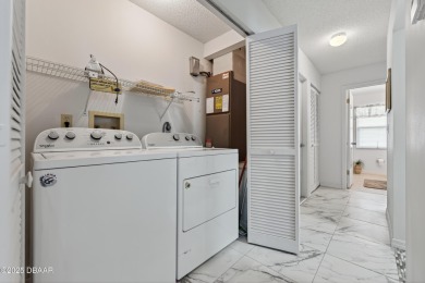 Warm and Inviting 2 bedroom 2 bath patio-style condo in a on The Club At Pelican Bay - South Course in Florida - for sale on GolfHomes.com, golf home, golf lot