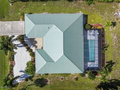 Welcome to this 3-bedroom, 2.5-bathroom pool home on Pine Island on Alden Pines Golf Club in Florida - for sale on GolfHomes.com, golf home, golf lot