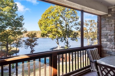 Experience resort-style living with this exceptional lakefront on Bella Vista Country Club - Berksdale in Arkansas - for sale on GolfHomes.com, golf home, golf lot