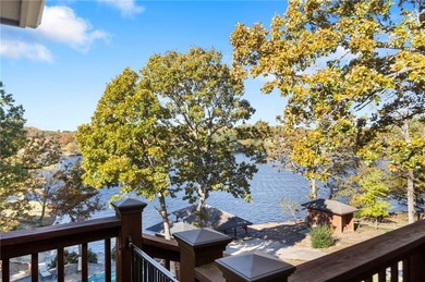 Experience resort-style living with this exceptional lakefront on Bella Vista Country Club - Berksdale in Arkansas - for sale on GolfHomes.com, golf home, golf lot