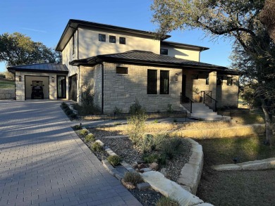 Stylish Hill Country contemporary home backing up to the #1 tee on Apple Rock Golf Course - Horseshoe Bay in Texas - for sale on GolfHomes.com, golf home, golf lot
