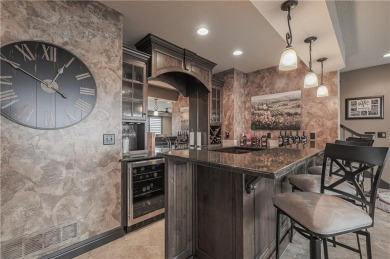 This stunning reverse 1.5-story home in Creekmoor offers an on Golf Club of Creekmoor in Missouri - for sale on GolfHomes.com, golf home, golf lot