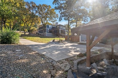 Experience resort-style living with this exceptional lakefront on Bella Vista Country Club - Berksdale in Arkansas - for sale on GolfHomes.com, golf home, golf lot