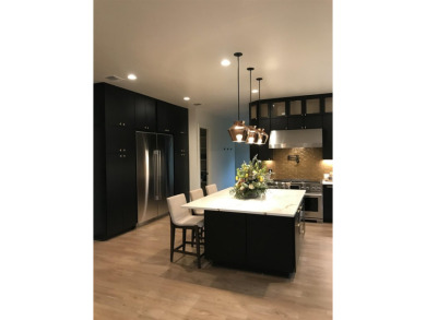 Stylish Hill Country contemporary home backing up to the #1 tee on Apple Rock Golf Course - Horseshoe Bay in Texas - for sale on GolfHomes.com, golf home, golf lot