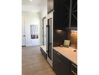 Stylish Hill Country contemporary home backing up to the #1 tee on Apple Rock Golf Course - Horseshoe Bay in Texas - for sale on GolfHomes.com, golf home, golf lot
