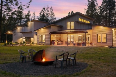 Tucked on nearly 6 private acres within Spokane city limits on The Creek at Qualchan in Washington - for sale on GolfHomes.com, golf home, golf lot