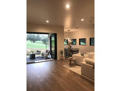 Stylish Hill Country contemporary home backing up to the #1 tee on Apple Rock Golf Course - Horseshoe Bay in Texas - for sale on GolfHomes.com, golf home, golf lot