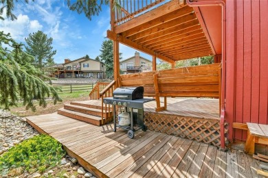 SITTING ON THE GOLF COURSE with both **mountain and city views** on Red Rocks Country Club in Colorado - for sale on GolfHomes.com, golf home, golf lot