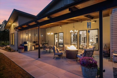 Tucked on nearly 6 private acres within Spokane city limits on The Creek at Qualchan in Washington - for sale on GolfHomes.com, golf home, golf lot