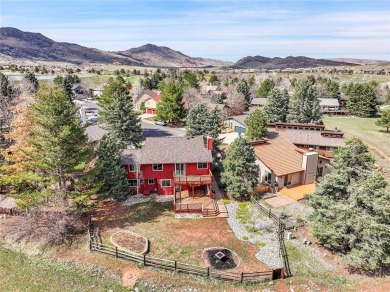 SITTING ON THE GOLF COURSE with both **mountain and city views** on Red Rocks Country Club in Colorado - for sale on GolfHomes.com, golf home, golf lot
