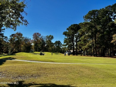 Great curb appeal in this immaculately maintained brick split on Emerald Golf Club in North Carolina - for sale on GolfHomes.com, golf home, golf lot