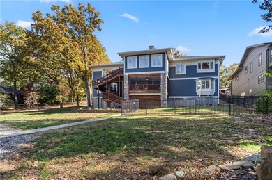 Experience resort-style living with this exceptional lakefront on Bella Vista Country Club - Berksdale in Arkansas - for sale on GolfHomes.com, golf home, golf lot