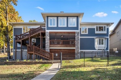 Experience resort-style living with this exceptional lakefront on Bella Vista Country Club - Berksdale in Arkansas - for sale on GolfHomes.com, golf home, golf lot