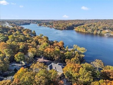 Experience resort-style living with this exceptional lakefront on Bella Vista Country Club - Berksdale in Arkansas - for sale on GolfHomes.com, golf home, golf lot
