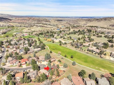SITTING ON THE GOLF COURSE with both **mountain and city views** on Red Rocks Country Club in Colorado - for sale on GolfHomes.com, golf home, golf lot