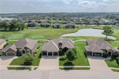 This stunning reverse 1.5-story home in Creekmoor offers an on Golf Club of Creekmoor in Missouri - for sale on GolfHomes.com, golf home, golf lot