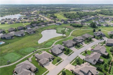 This stunning reverse 1.5-story home in Creekmoor offers an on Golf Club of Creekmoor in Missouri - for sale on GolfHomes.com, golf home, golf lot