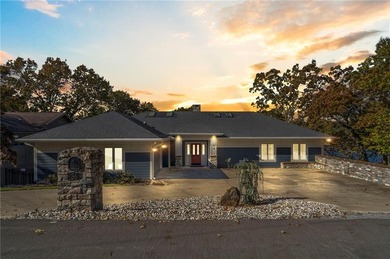 Experience resort-style living with this exceptional lakefront on Bella Vista Country Club - Berksdale in Arkansas - for sale on GolfHomes.com, golf home, golf lot