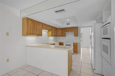 Short Sale. Step into a high-value opportunity in the on IMG Academies Golf and Country Club in Florida - for sale on GolfHomes.com, golf home, golf lot