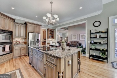 Discover the ultimate in upscale living in one of the area's on Royal Lakes Golf and Country Club in Georgia - for sale on GolfHomes.com, golf home, golf lot